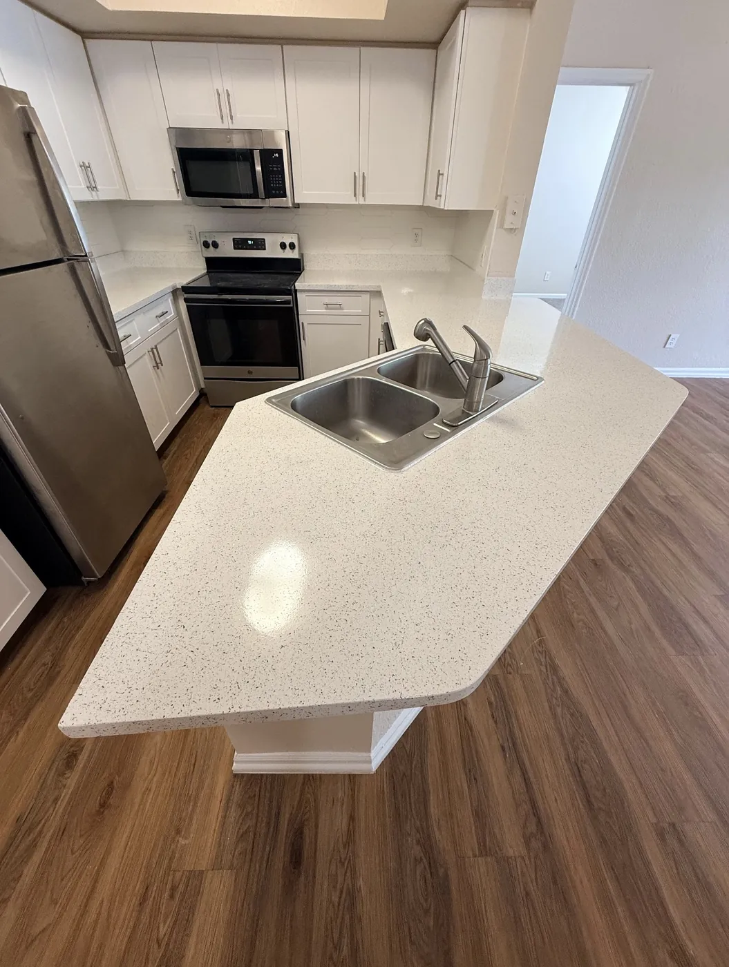 Countertop refinishing by Narbra Maintenance Inc