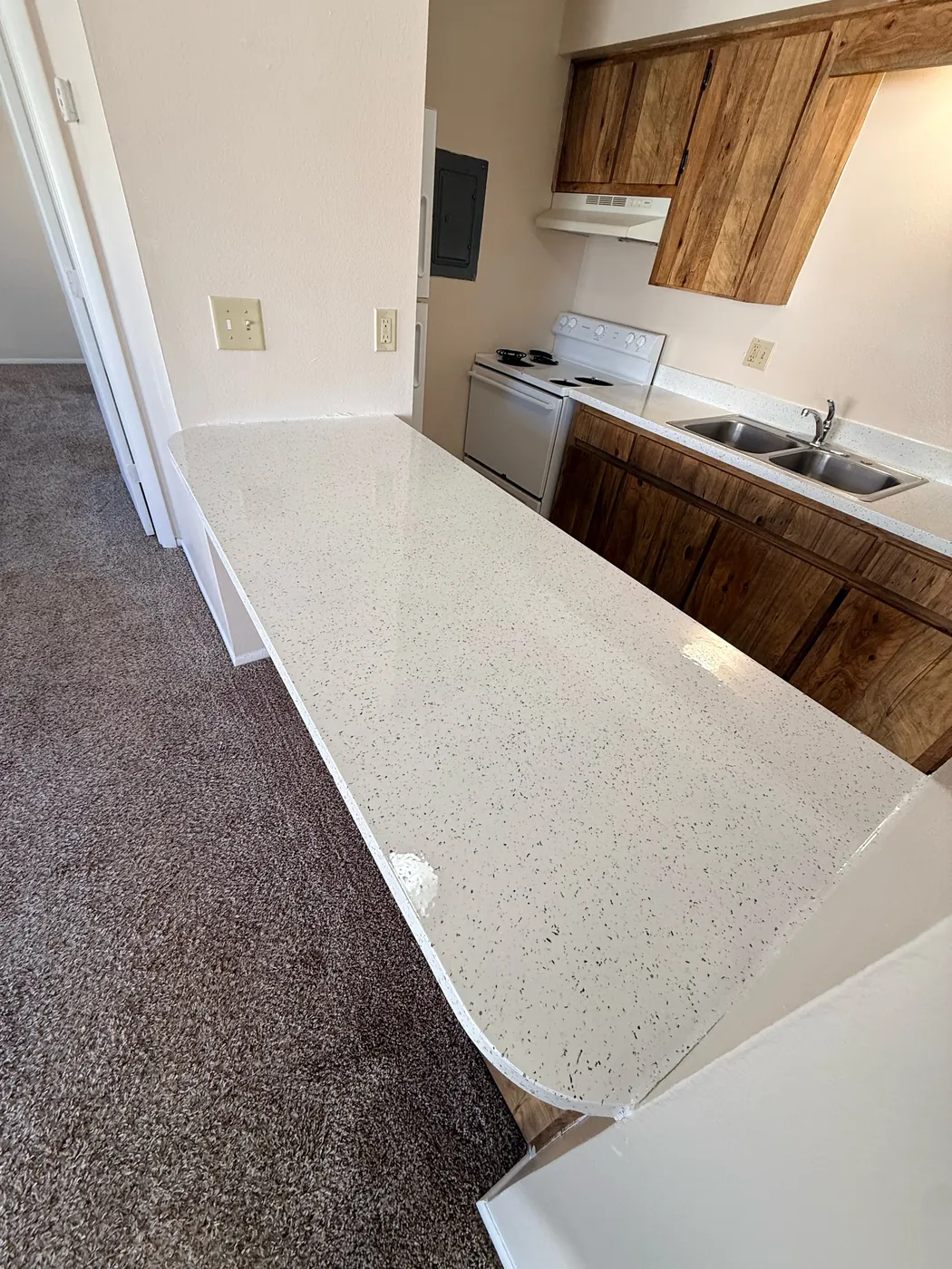 Countertop refinishing by Narbra Maintenance Inc